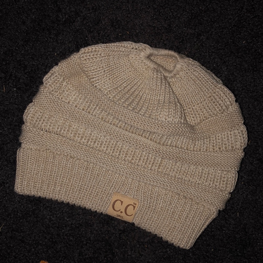 Toboggan hat with hole in top for pony tale